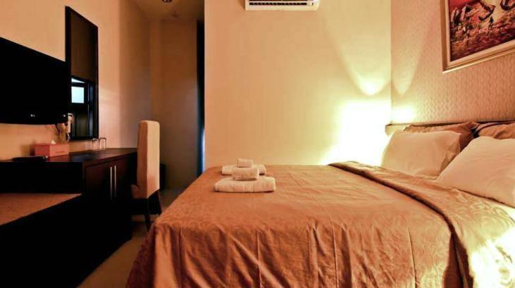 Hotel Marina Ambon Rom bilde